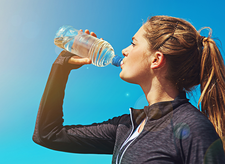 gym-goer drinking water