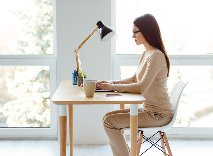 women sitting a desk