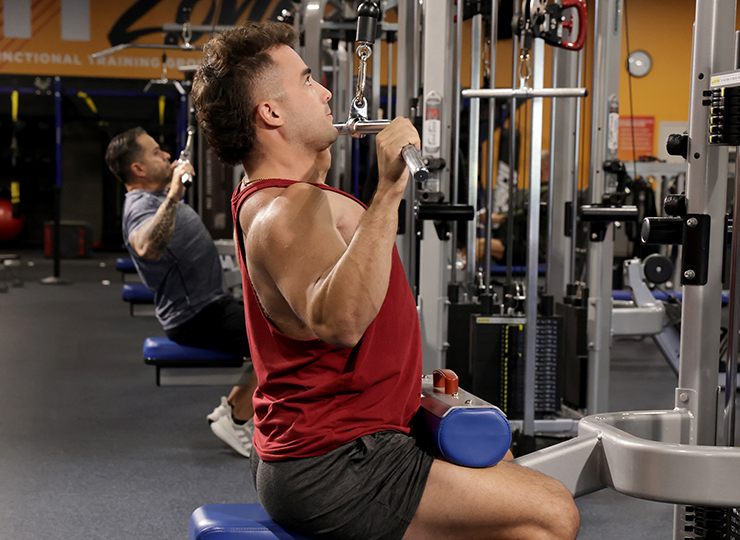 gym-goer working out back