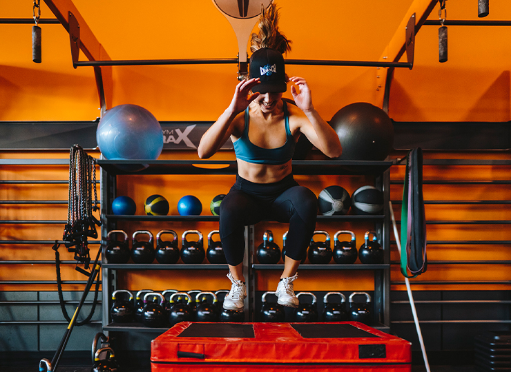 gym-goer box jumping 