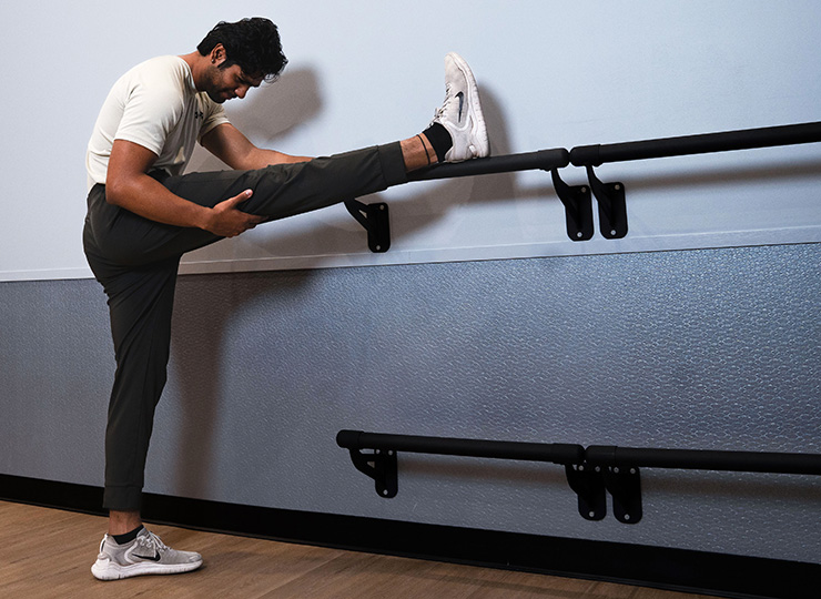 gym-goer stretching out legs