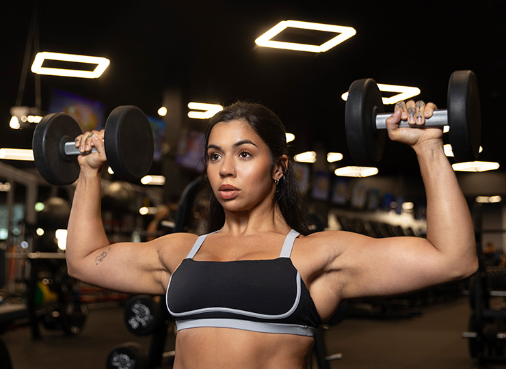 gym-goer lifting arm weights