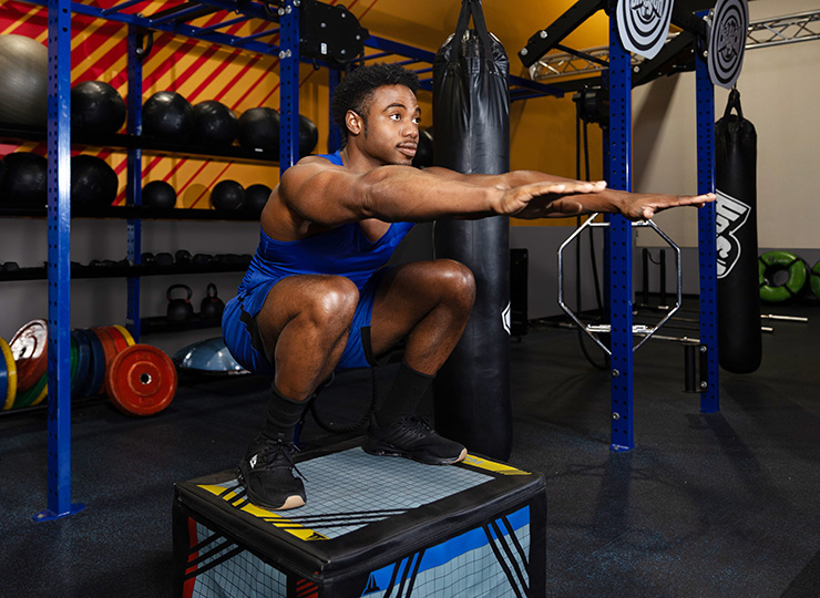 gym-goer squating
