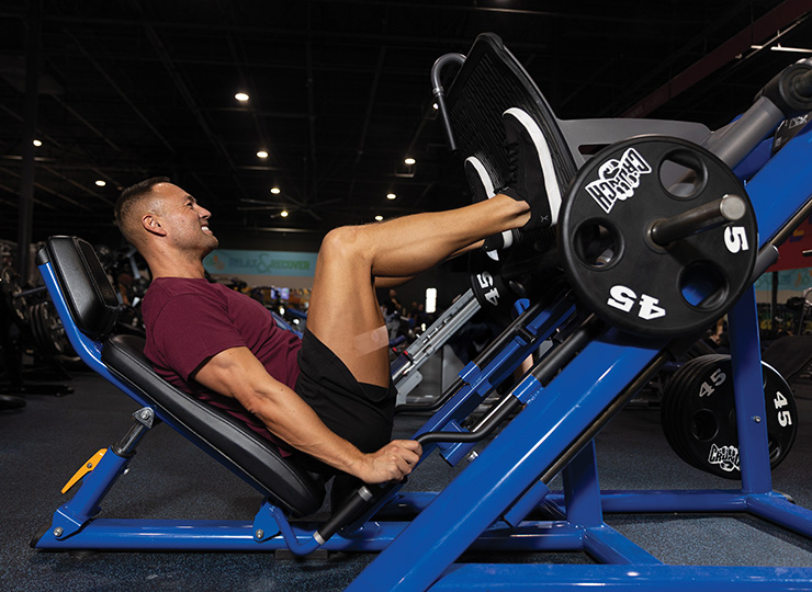 gym-goer bench pressing