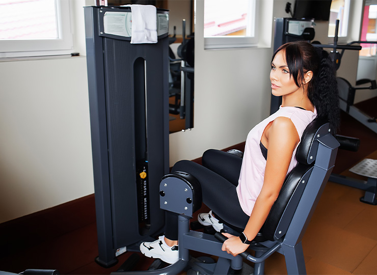gym-goer working out with machine