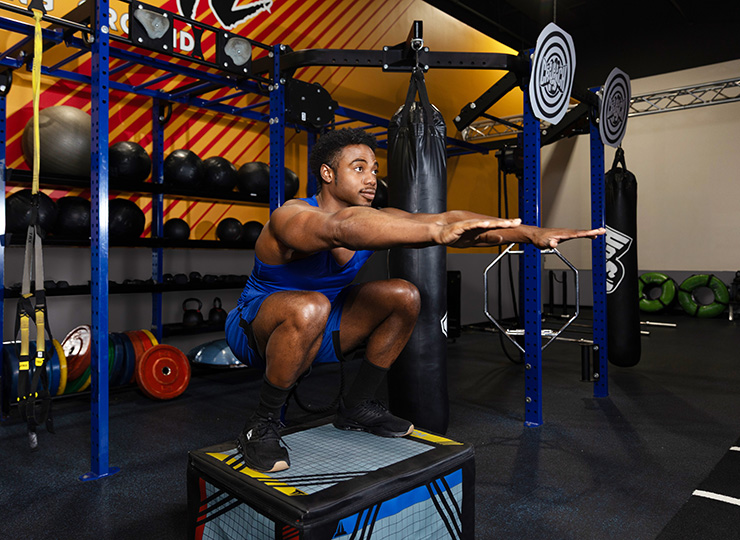 gym-goer squating