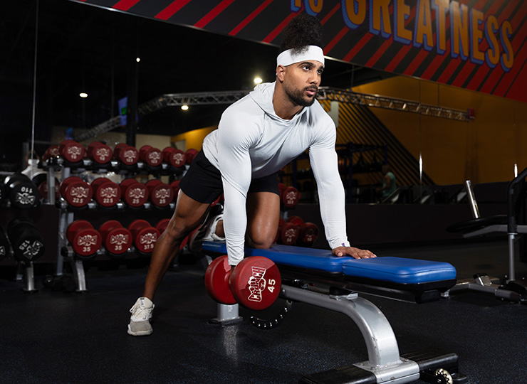 gym-goer lifting weights with arms