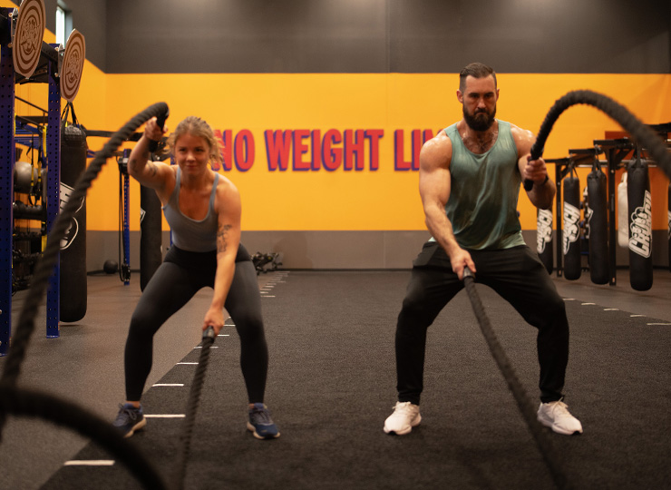 gym goer rope work out